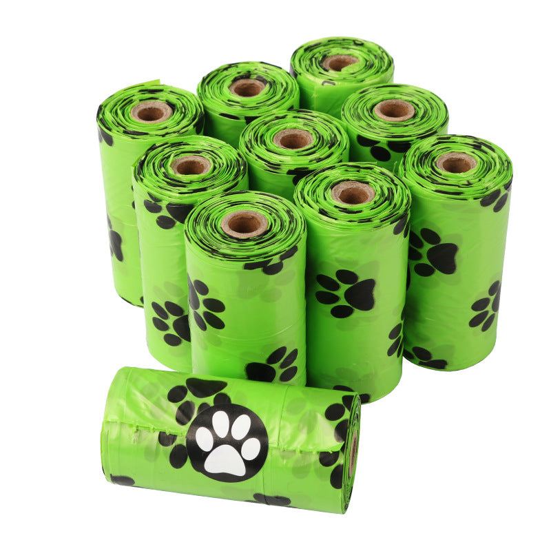 Green continuous roll dog poop bags with dispenser for pet waste cleanup