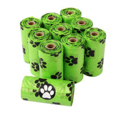 Roll of green biodegradable dog poop bags for pet waste disposal
