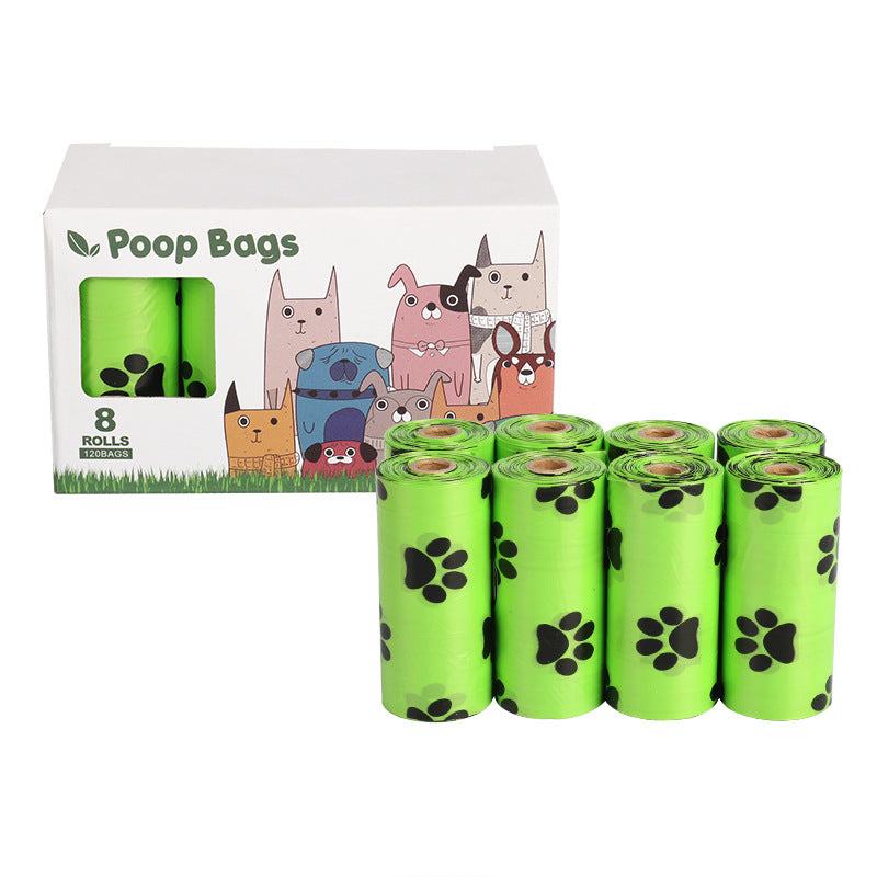 Roll of green biodegradable dog poop bags for pet waste disposal