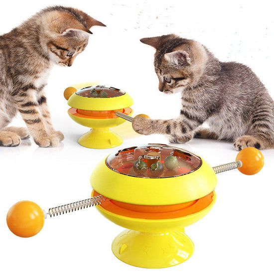 Rotatable cat toy with suction cup and catnip balls for interactive kitten play