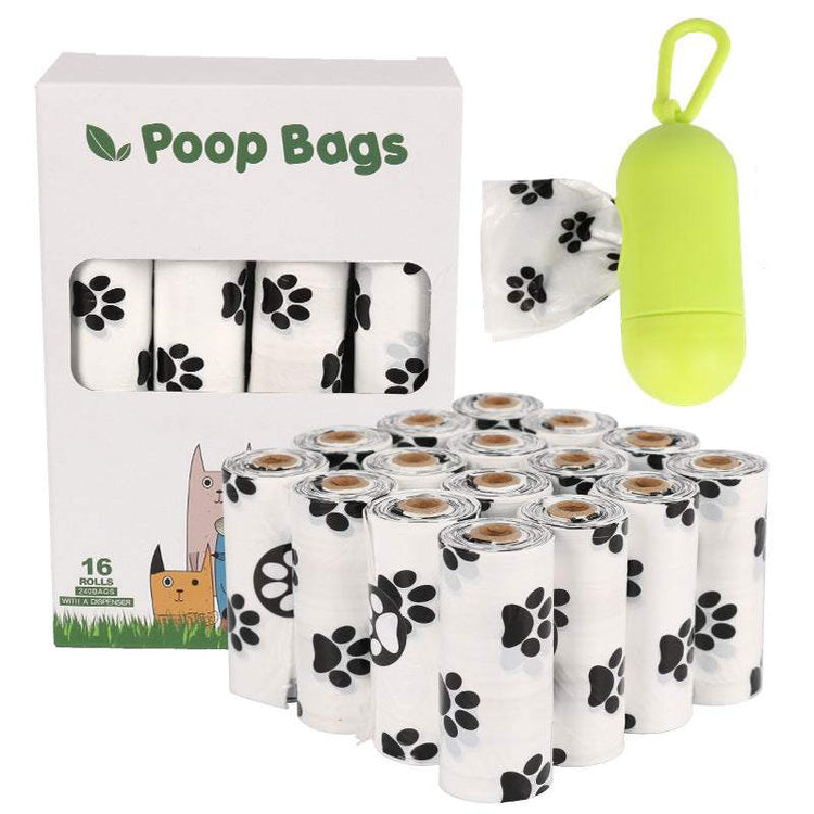 Roll of green biodegradable dog poop bags for pet waste cleanup