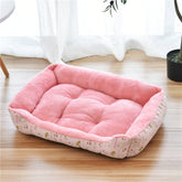 Golden Retriever resting on autumn and winter cotton dog mat kennel pet supplies