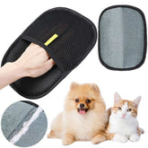 Black pet hair remover mitt with soft silicone bristles for grooming dogs, cats, and rabbits