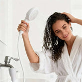 Portable handheld faucet sprayer with easy-install adapter for shampooing and pet bathing, durable ABS material, ideal for home, travel, and RV use